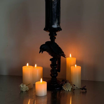 Dark raven ceramic candleholder with sculptural form